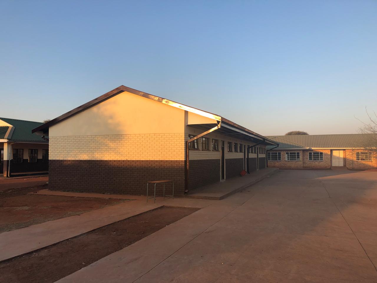 Renovated classroom block at Modise Secondary School at sunset